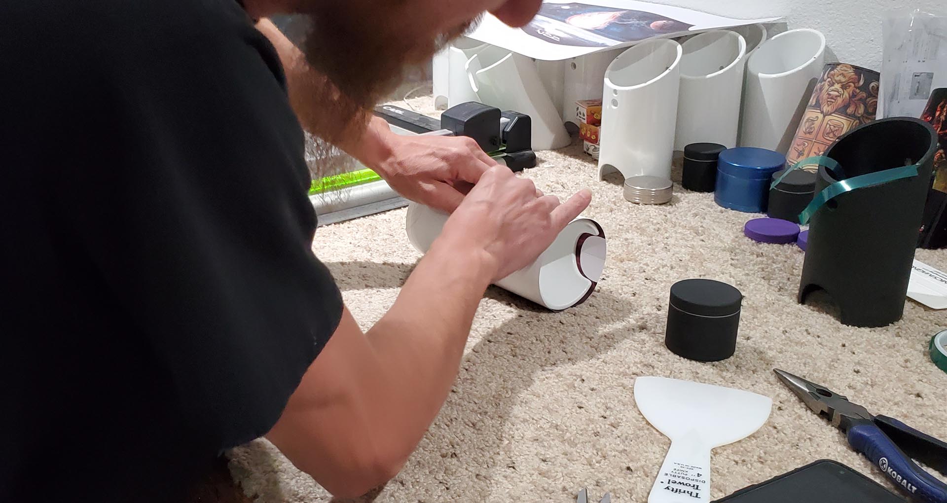 Chris Carefully Putting The Sublimation Paper On The Tube Chris Carefully Putting The Sublimation Paper On The Tube
